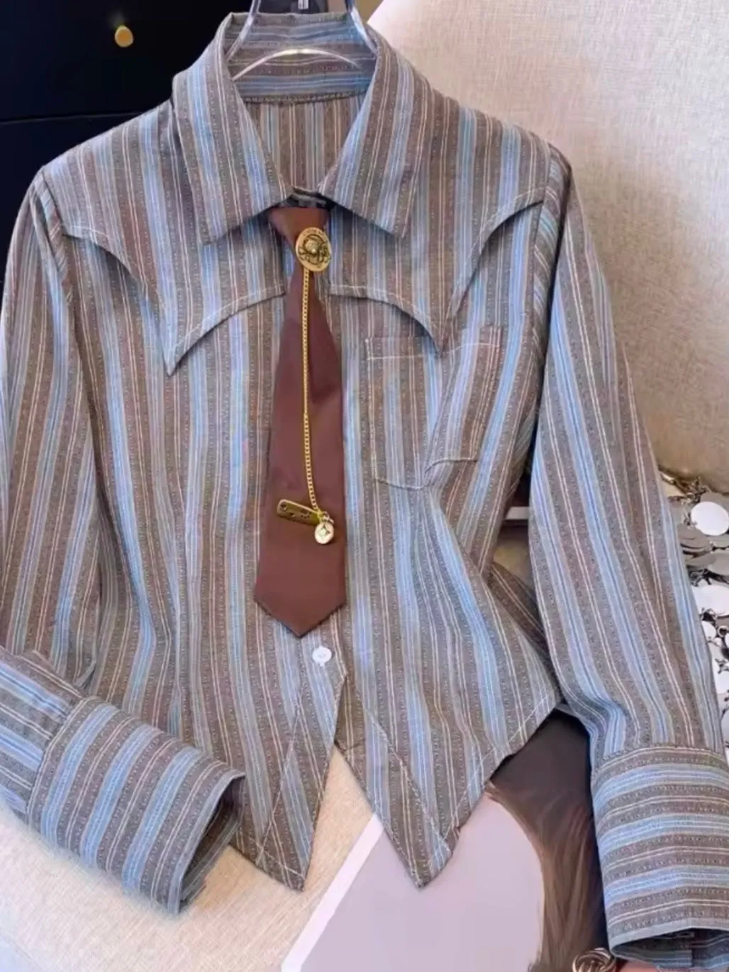 Blue and brown striped tie shirt